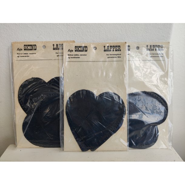 L�derlapper fra 1960'erne, sort hjerte