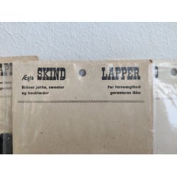 L�derlapper fra 1960'erne, sort hjerte