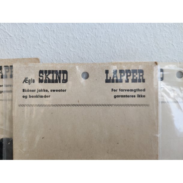 L�derlapper fra 1960'erne, sort hjerte