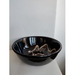 Sort hvid gammel keramiksk�l med swirly glasur