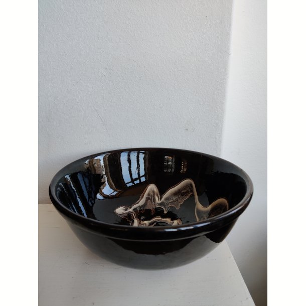 Sort hvid gammel keramiksk�l med swirly glasur