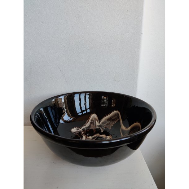 Sort hvid gammel keramiksk�l med swirly glasur