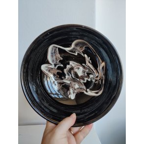 Sort hvid gammel keramiksk�l med swirly glasur
