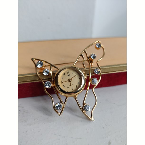 Firserbroche med ur og bling