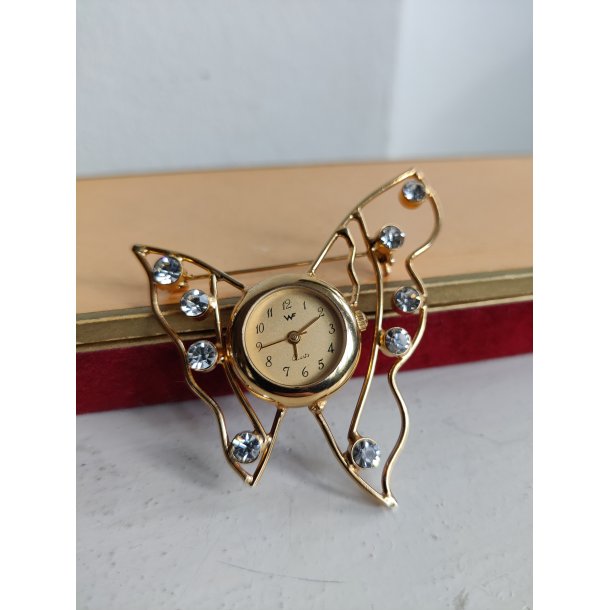 Firserbroche med ur og bling
