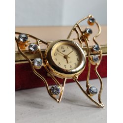 Firserbroche med ur og bling