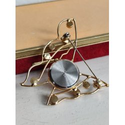 Firserbroche med ur og bling