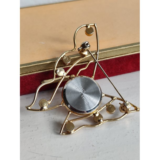 Firserbroche med ur og bling