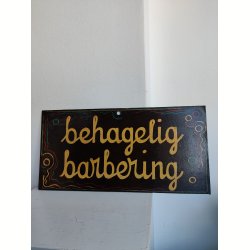 Gammelt skilt fra barber: Behagelig barbering