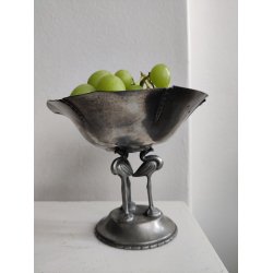 Tinopsats med tre flamingoer