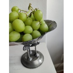 Tinopsats med tre flamingoer