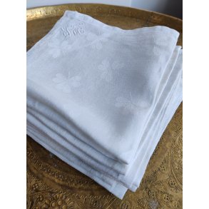 8 gamle stofservietter med mnster af klver