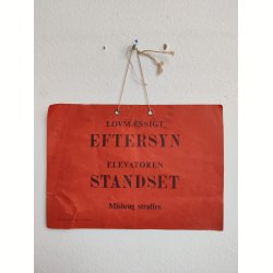 Gammelt skilt fra elevator