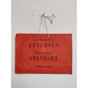 Gammelt skilt fra elevator