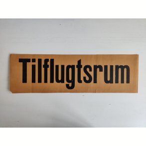 Tilflugtsrum. Gammelt papirskilt