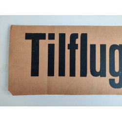 Tilflugtsrum. Gammelt papirskilt
