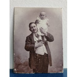 Antikt foto af en far med barn