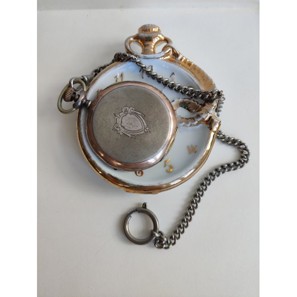 Porcel�ns-holder til lommeur