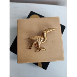 Forgyldt messingbroche med tukan, 1930-1940