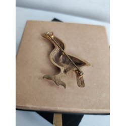 Forgyldt messingbroche med tukan, 1930-1940