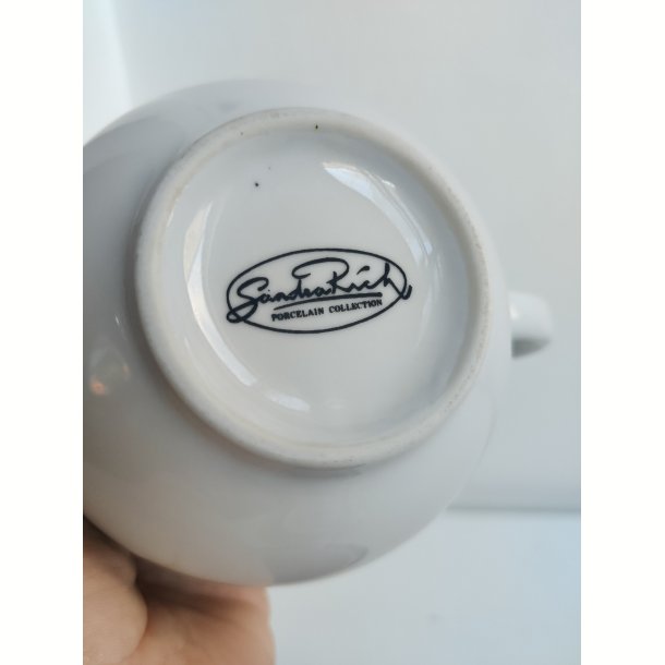 K�mpe kaffekopper fra 1990'erne med sol og m�ne